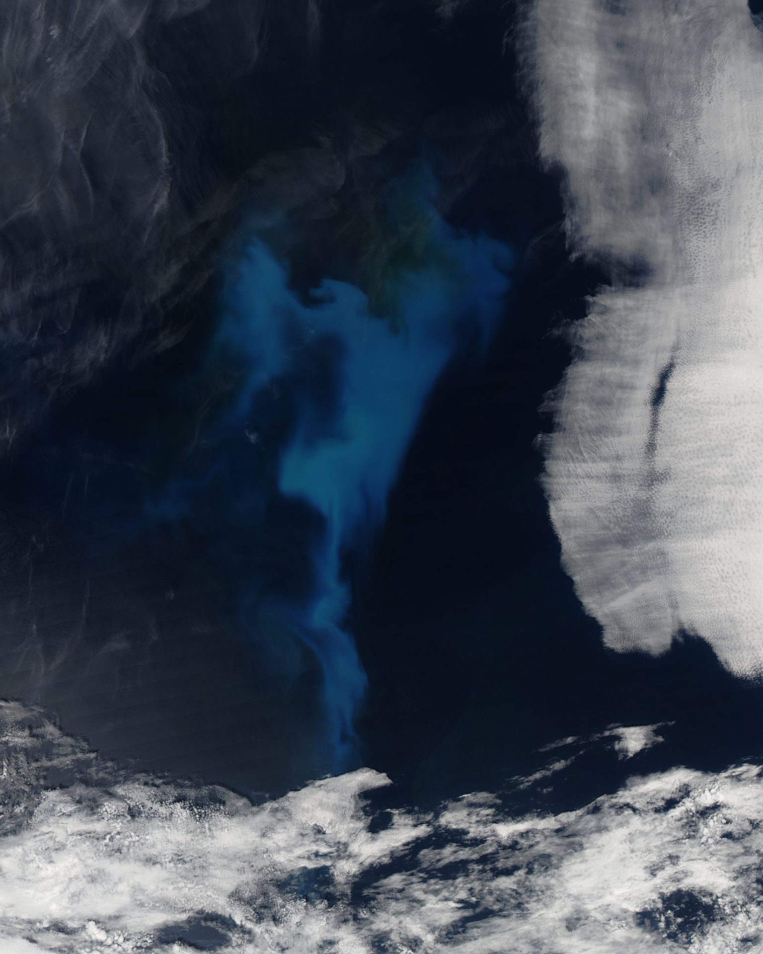 Swirls of a phytoplankton bloom in the deep blue central North Atlantic Ocean, seen by satellite