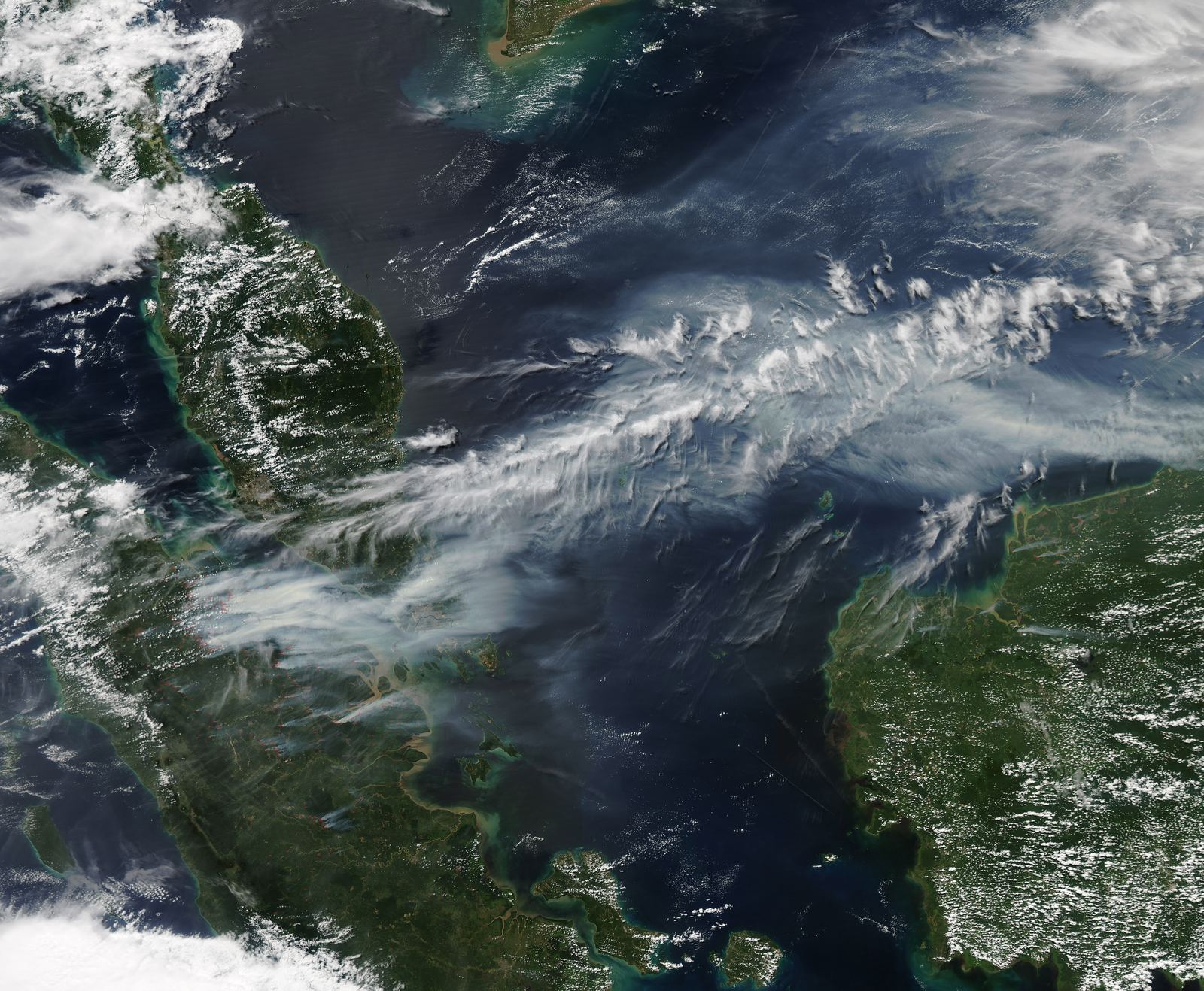 Smoke from fires on Sumatra blowing toward Malaysia and Singapore, seen by NASA's Aqua satellite